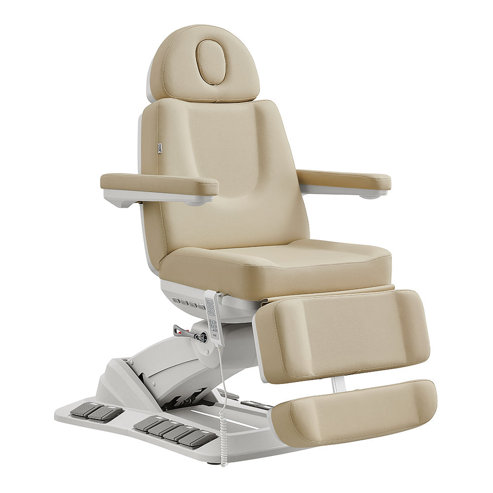 Aurora Medical Spa Table by DIR: beige, adjustable, padded with armrests & footrests.