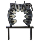 Black metal arch with multiple small rectangular objects on a white background