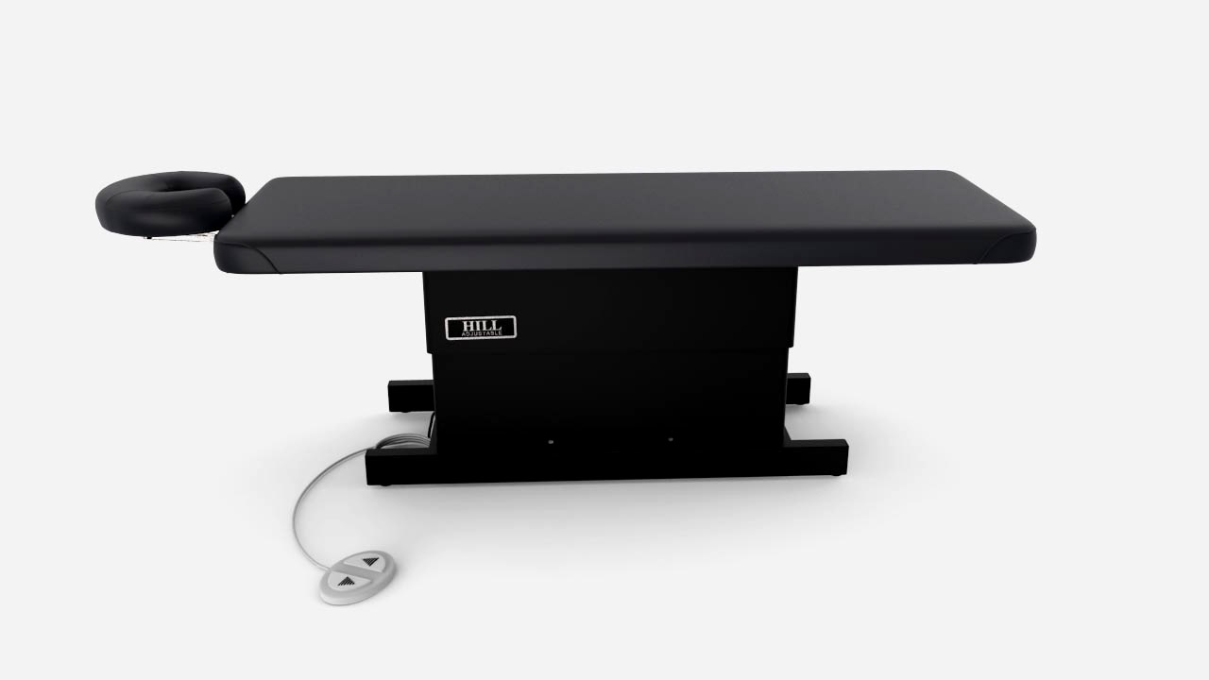 Hill Laboratories Massage Electric Lift Table in black with headrest, foot pedal, and cushioning.