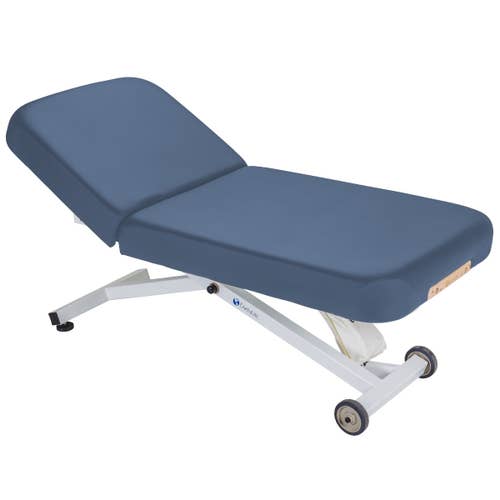 EarthLite Ellora Manual Tilt Top: adjustable electric lift table, blue upholstery, white frame on wheels.