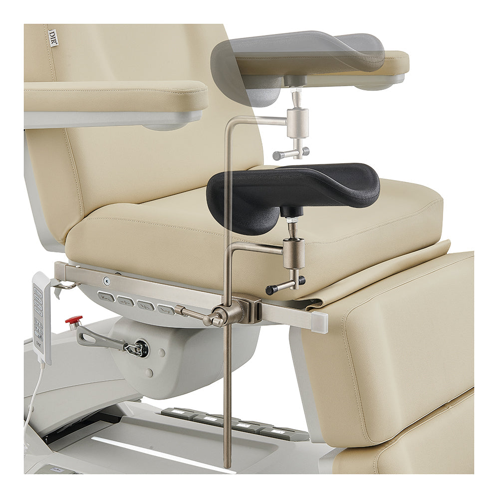 The DIR Geneva Exam Table is beige with black adjustable armrest and metal support attachment.