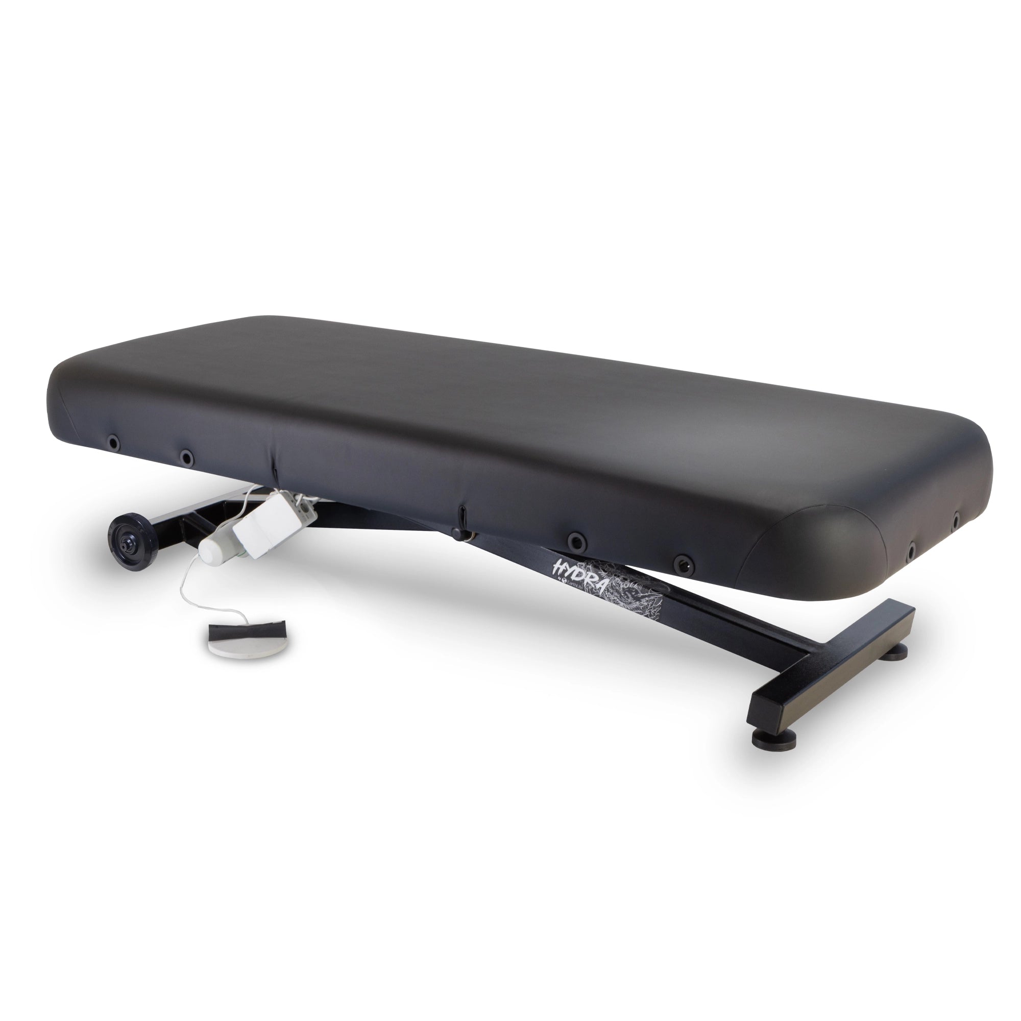 A black adjustable massage table with a padded cushion and metal support frame, shown on a clean white background. A small white control box with a cord is placed beside the table.