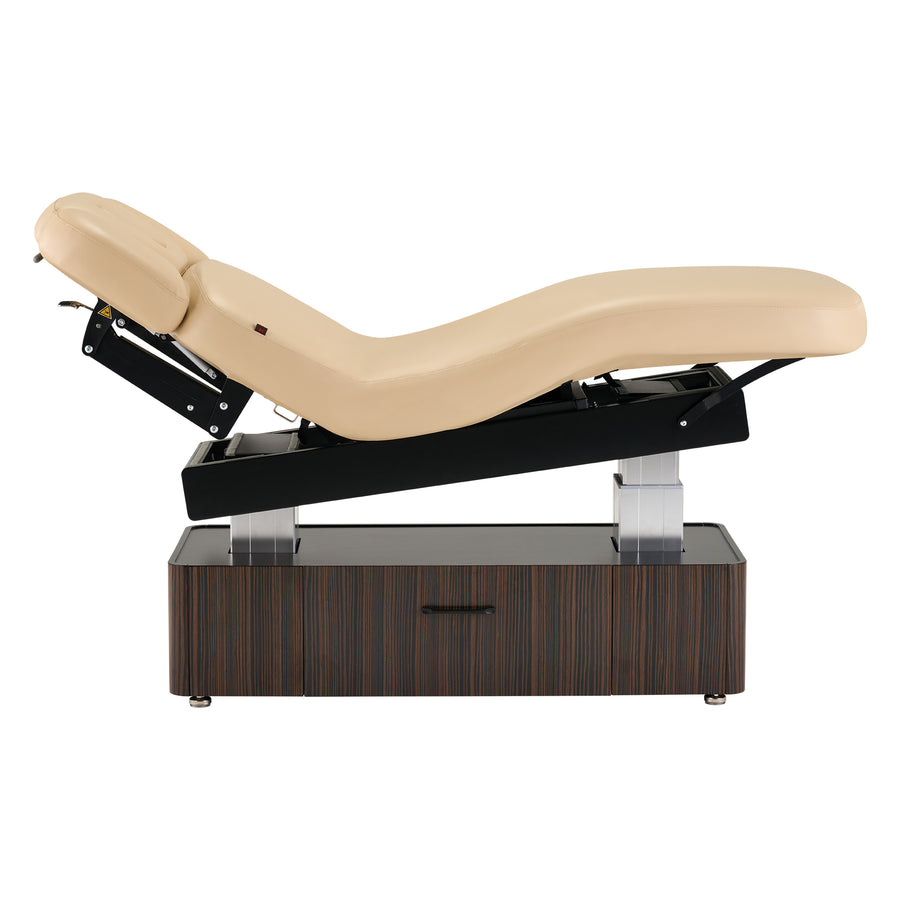 Beige massage table with ebony veneer on a white background