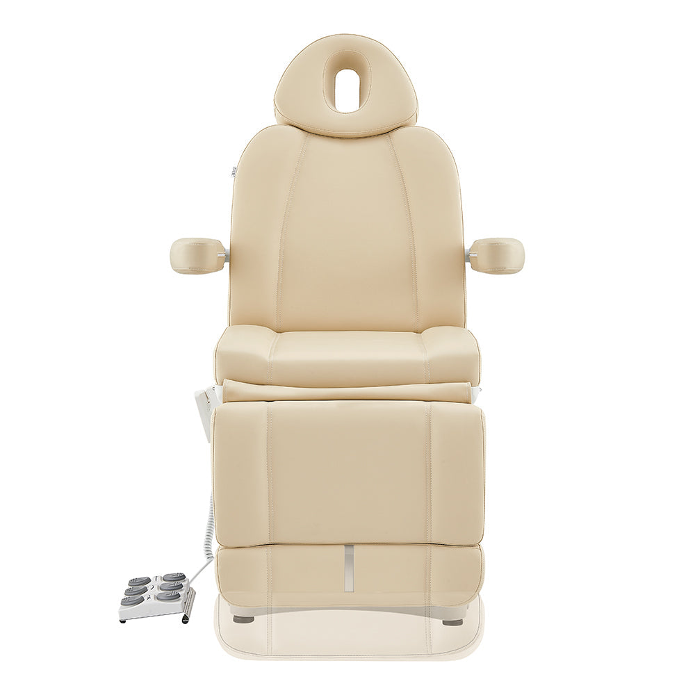 DIR Ink Electric Facial Beauty Bed Chair in beige with armrests and footrest, front view.