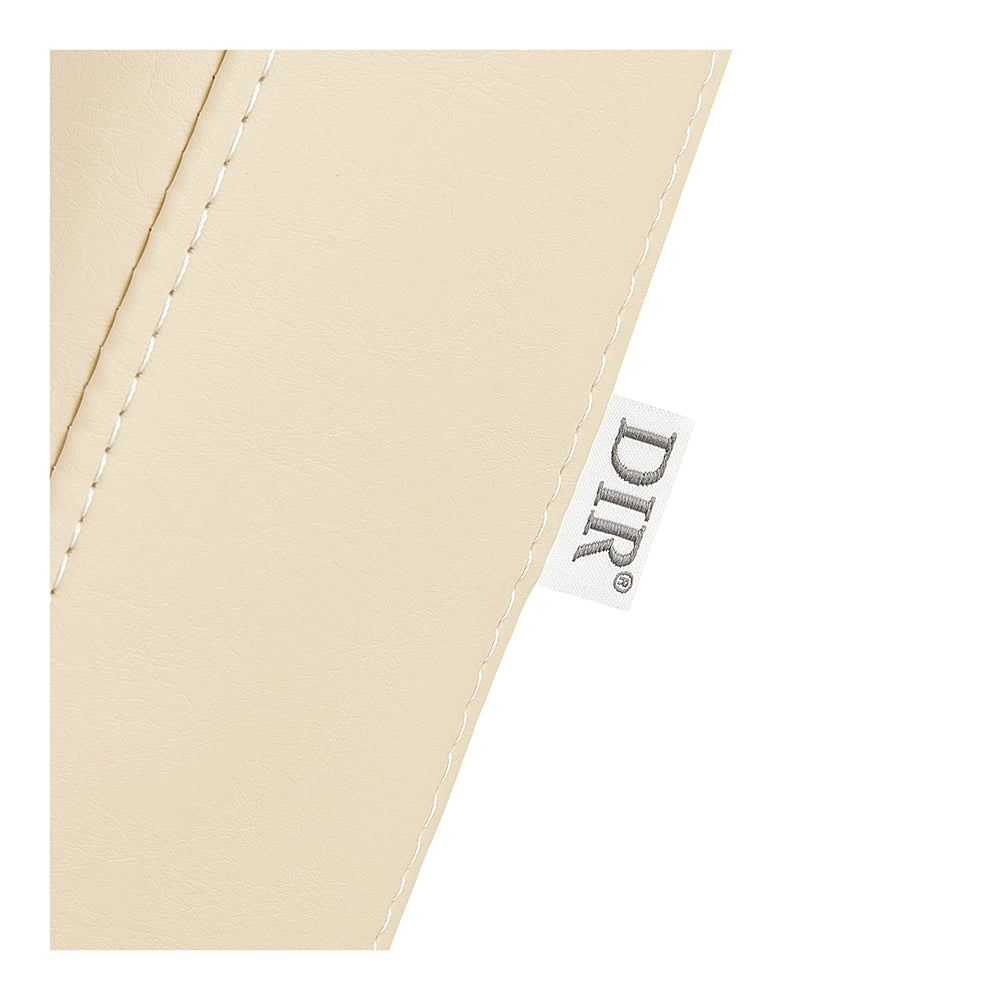 Close-up of beige stitched leather on DIR Mar Egeo 2-Motors Electric Medical Spa Treatment Bed.