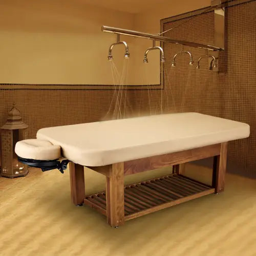 Living Earth Crafts NAPA LA MER teak spa table with overhead jets for a relaxing spa room.