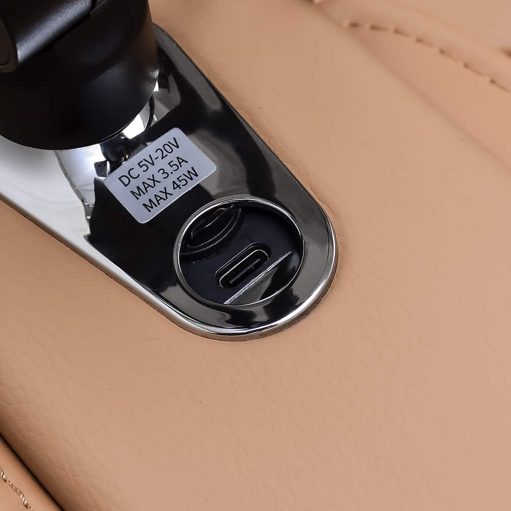 Close-up of a USB-C port and power label on an Ogawa Master Drive AI 2.0 Massage Chair.