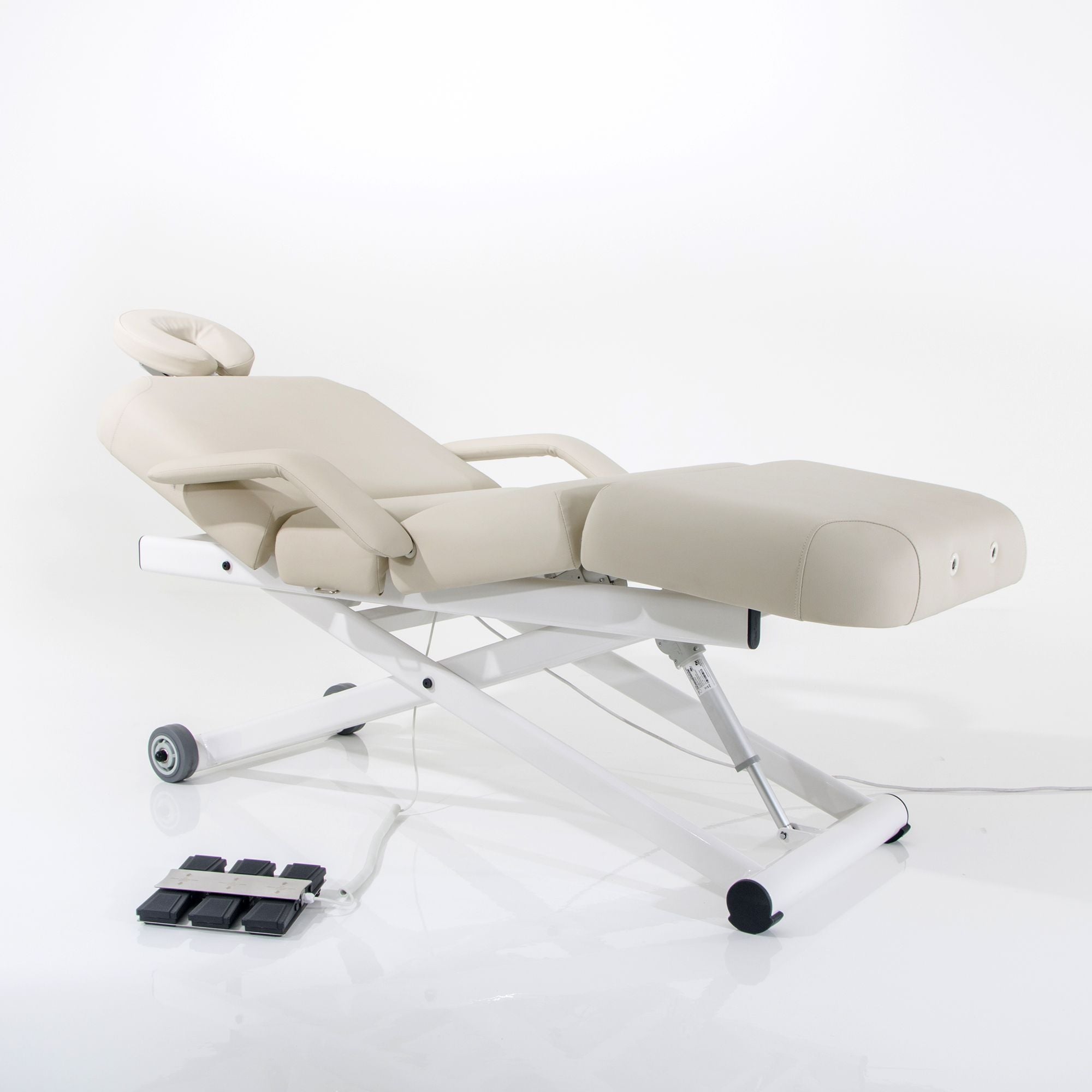 Silverfox America 2274B ADA-compliant beige electric massage bed with headrest, foot controls.