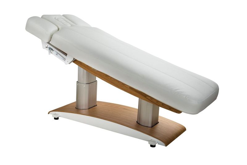 Silverfox America 2259Plus electric table with wood/metal base, shown inclined for spa use.