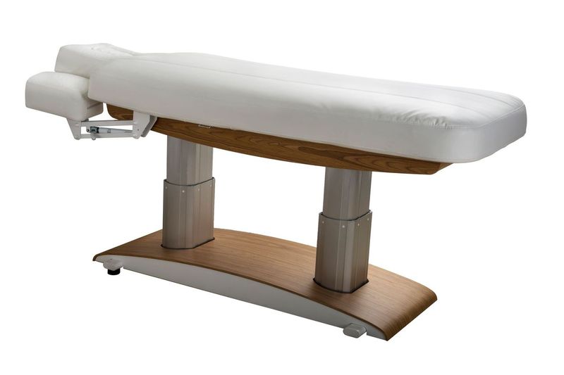 Silverfox America 2259Plus electric massage table with white padding and wooden base for spas.