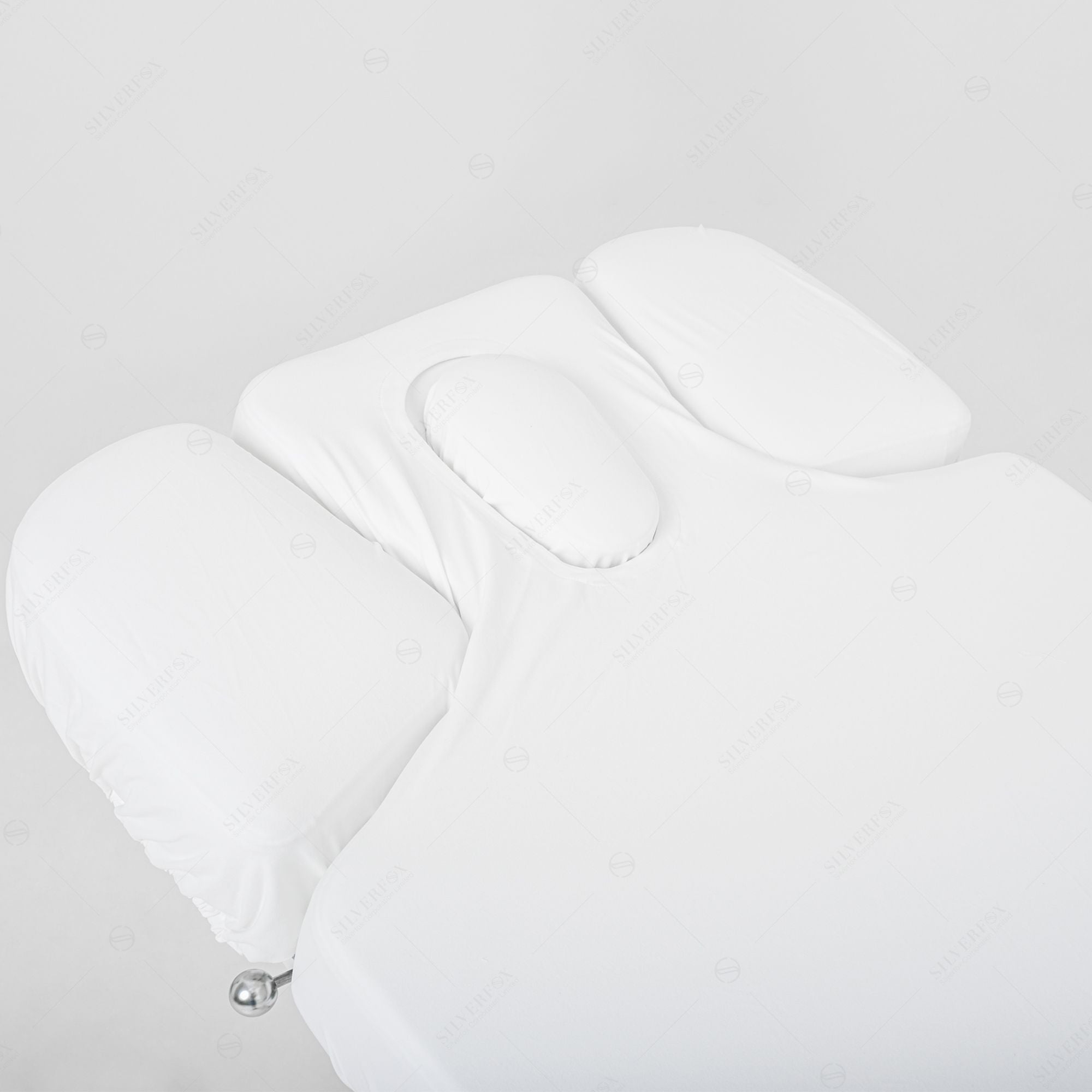 Silverfox America OCILI 2249 Electric Massage Table with face hole and armrests, top view.