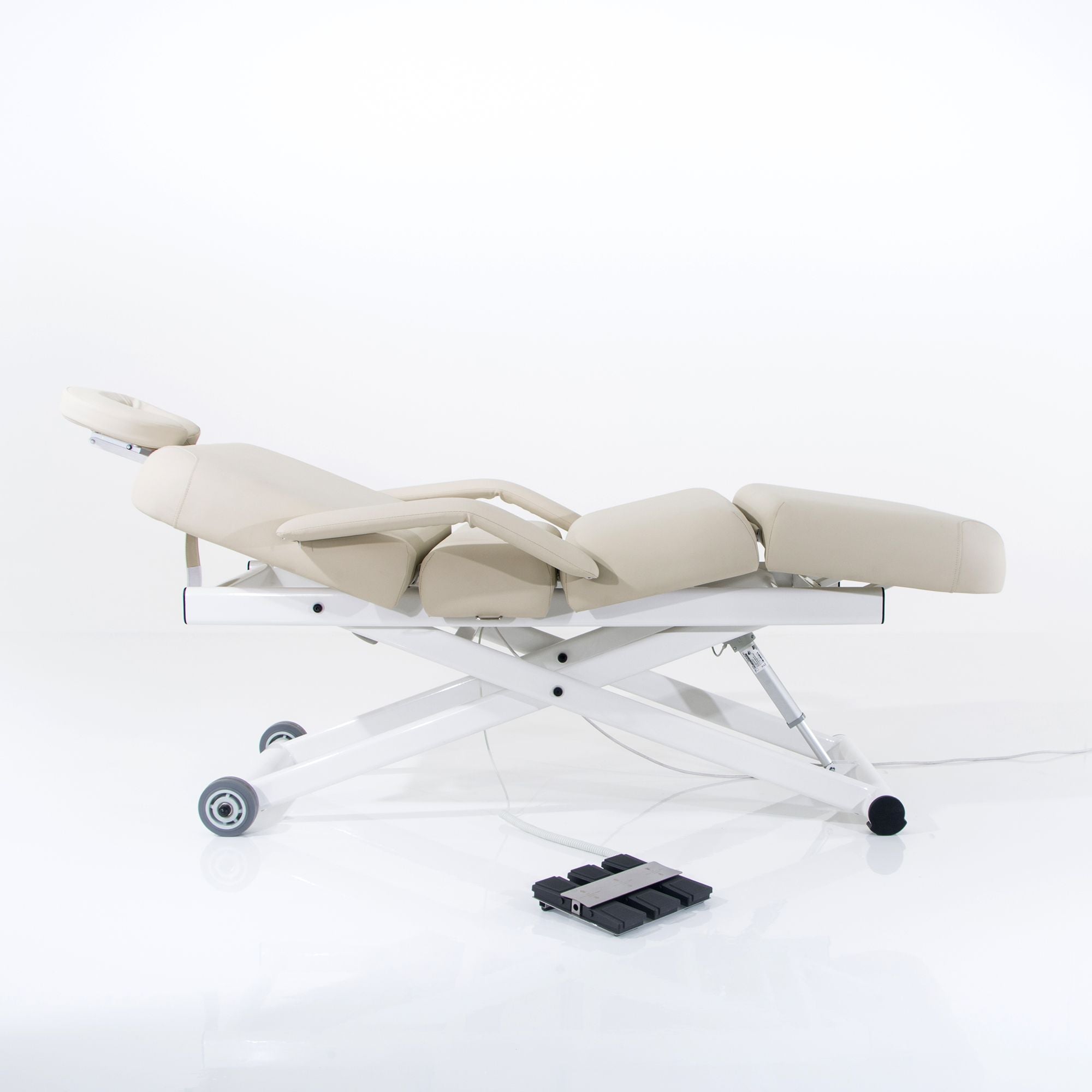Silverfox America 2274B Electric Massage Bed in beige with foot pedal, ADA compliant.