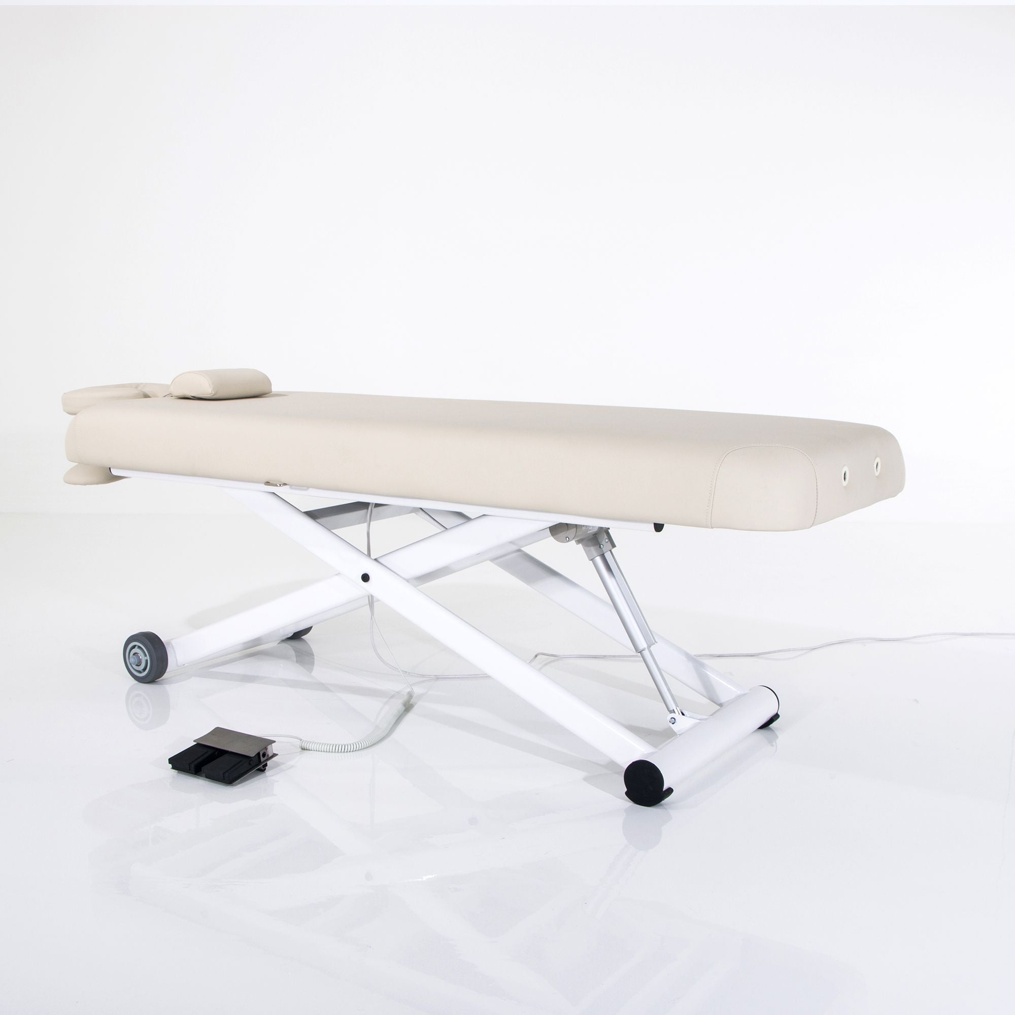 Silverfox America 2274 beige ADA electric massage table with headrest and foot controls.