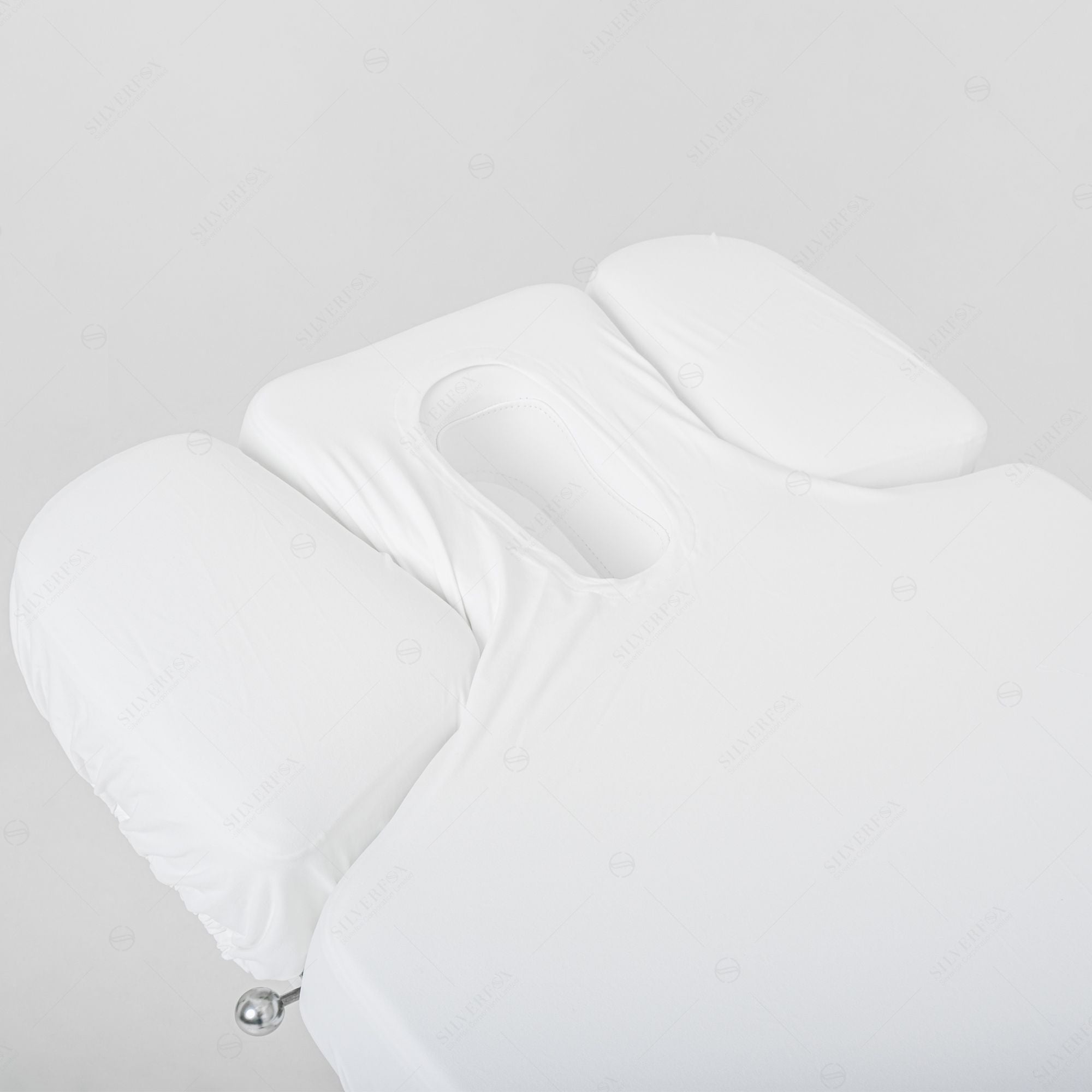 Silverfox America OCILI 2249 electric massage table with face hole, armrests, and fitted sheet.