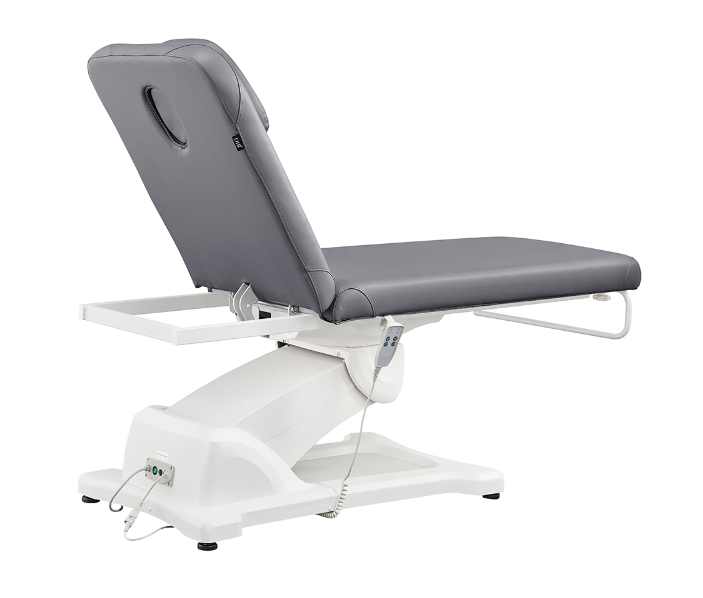 Serenity Electric Treatment Table by DIR, adjustable backrest, gray padding, white base.