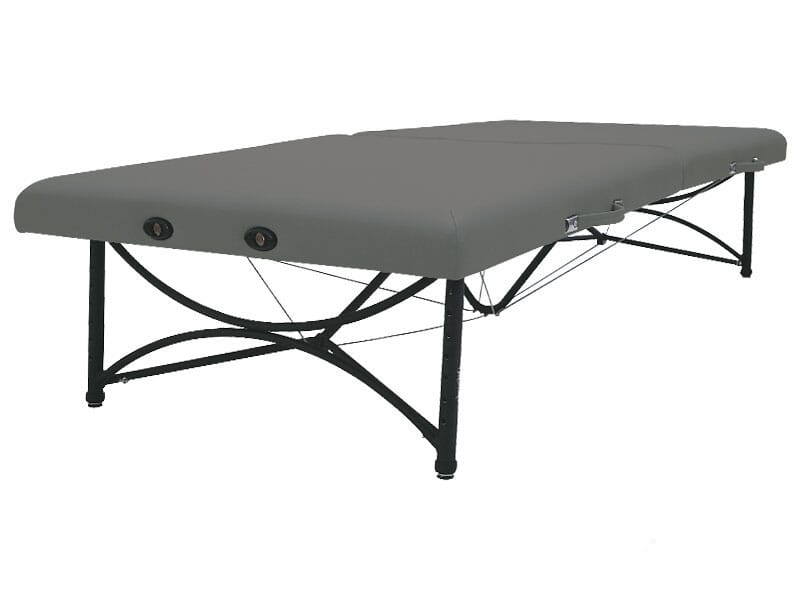 The Oakworks STORABLE Mat is a gray portable bariatric massage table with a black metal frame.