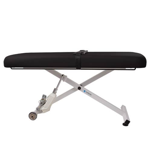 EarthLite ELLORA Flat Massage Table with Stretch Assist System and adjustable height.