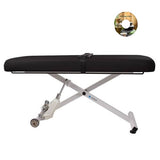 EarthLite ELLORA Flat Massage Table with Stretch Assist System with black cover.