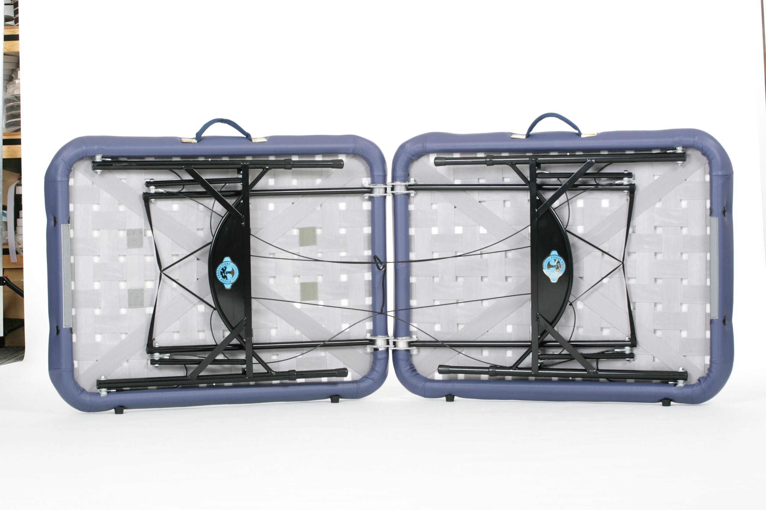 Pisces Pro NEW WAVE II Lite Portable Massage Table opened and laid flat on white background.