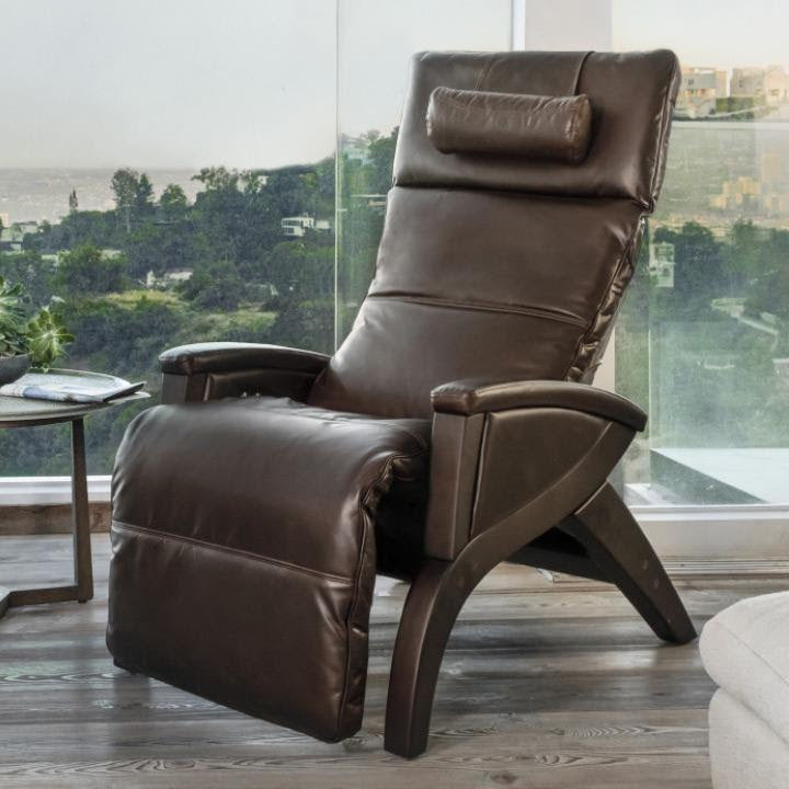 Svago Newton Zero Gravity Recliner in a modern room with large windows and wood flooring.