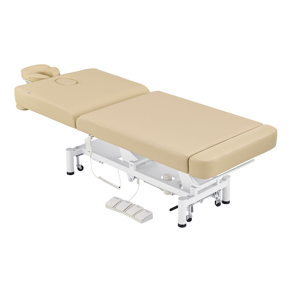 DIR WellRelax Treatment Table with headrest and foot controls, shown in beige on white background.