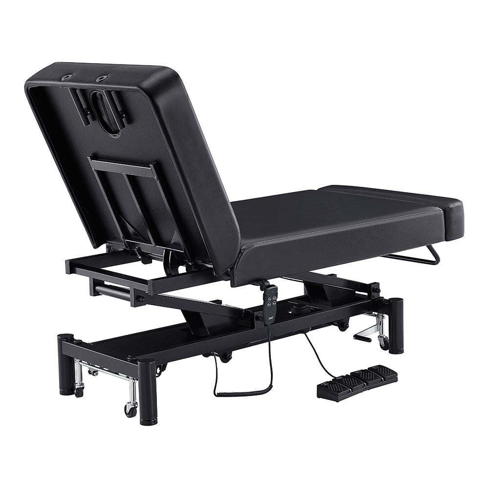 DIR WellRelax adjustable treatment table: black, headrest, electronic foot controls.