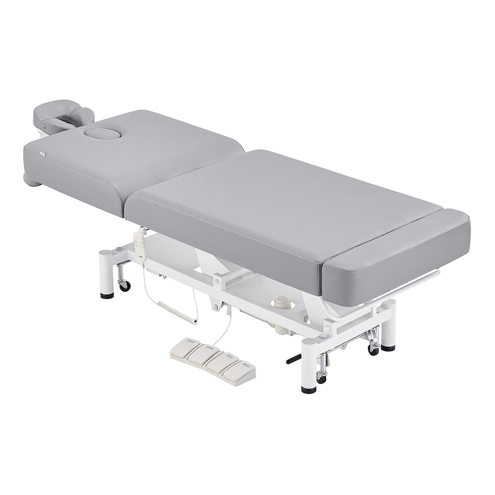 DIR WellRelax Treatment Table DIR: gray, adjustable, padded cushions, sturdy metal base.