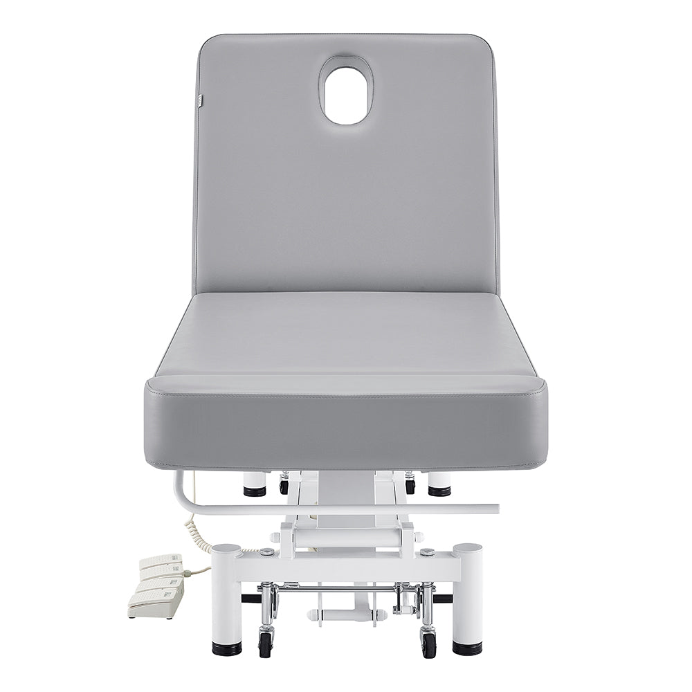 DIR WellRelax Treatment Table with headrest cutout and adjustable foot pedals.