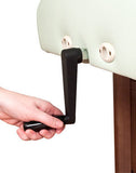 Hand turning black crank on Oakworks CLINICIAN Manual-Hydraulic Flat Top with green cushion.