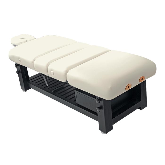 Comfort Soul DENALI ELITE Spa Treatment Table in white with black frame and headrest, angled view.