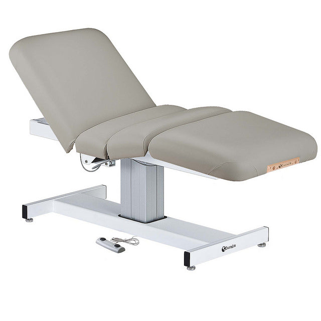 EarthLite EVEREST full electric salon table with grey cushioning and sturdy metal frame.