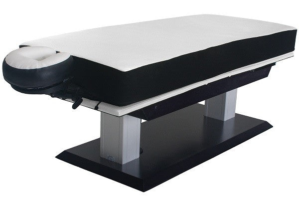 Living Earth Crafts ASPEN GT electric lift table with adjustable headrest and sturdy base.