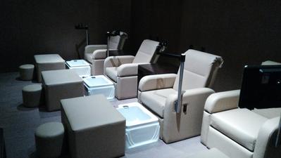 TouchAmerica HARMONY Pedicure Chairs with footbaths and stools for a relaxing foot soak.