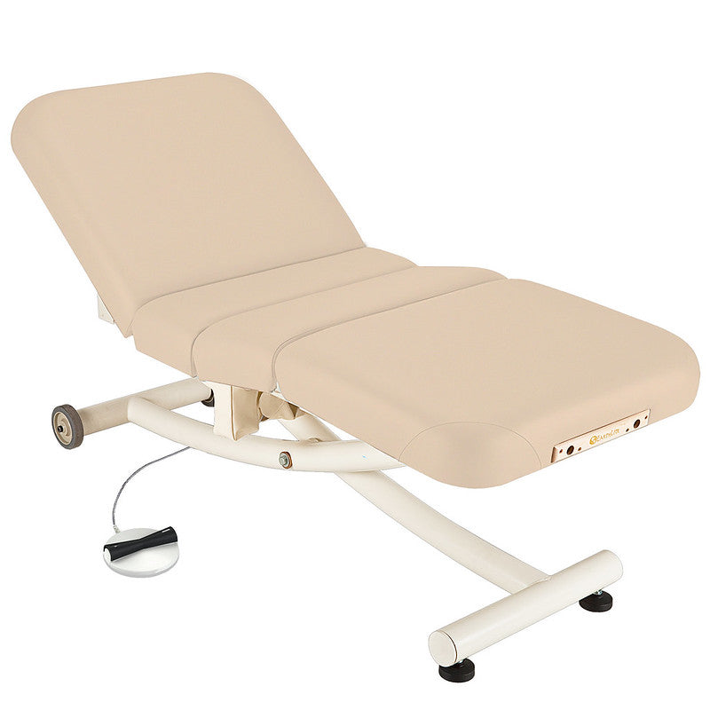 EarthLite ELLORA VISTA FULL ELECTRIC SALON Table with padded surface and wheels.
