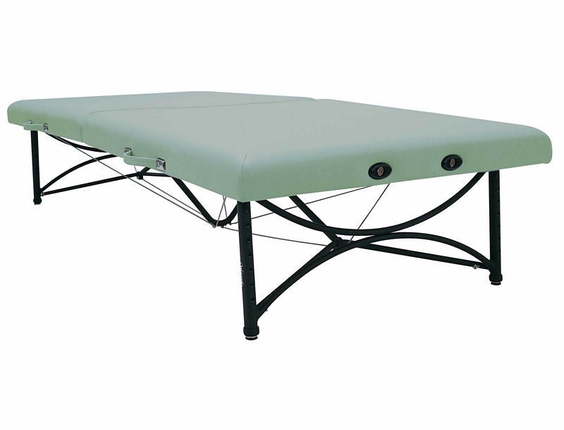 Oakworks STORABLE Mat Portable Massage Table, side view, with black metal legs and two face holes.