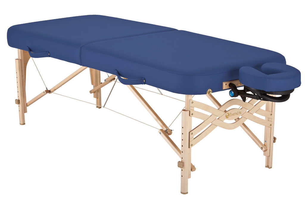 EarthLite SPIRIT portable massage table, blue, with wooden legs and face cradle.