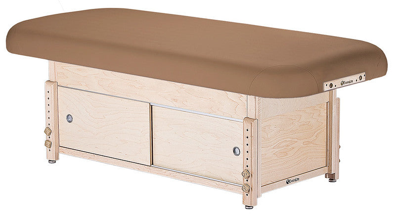 EarthLite SEDONA FLAT massage table: tan cushion, hardwood frame, built-in storage drawers.