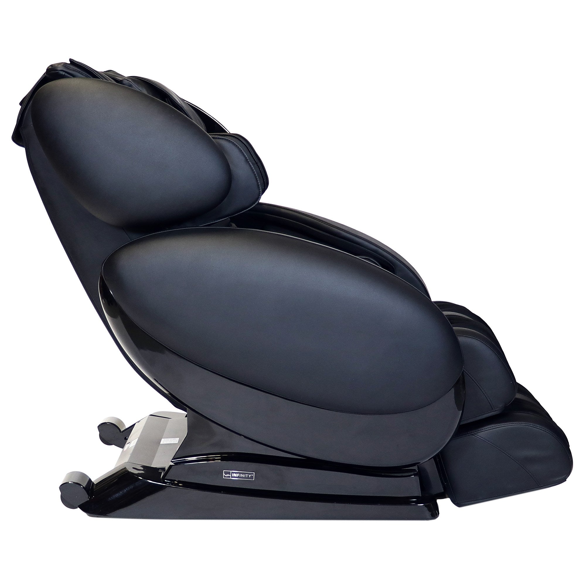 Infinity IT-8500 PLUS black massage chair with padded seat, spinal decompression, and leg supports.