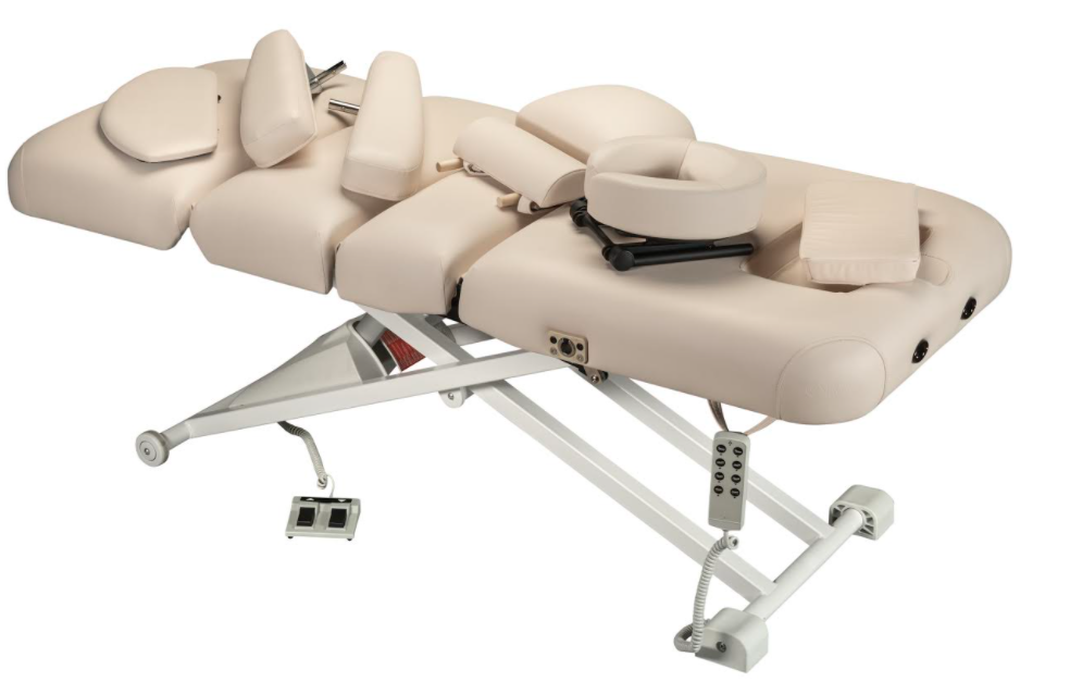 Nirvana Salon Top Electric Massage Table with headrest, arm supports, and electronic controls.