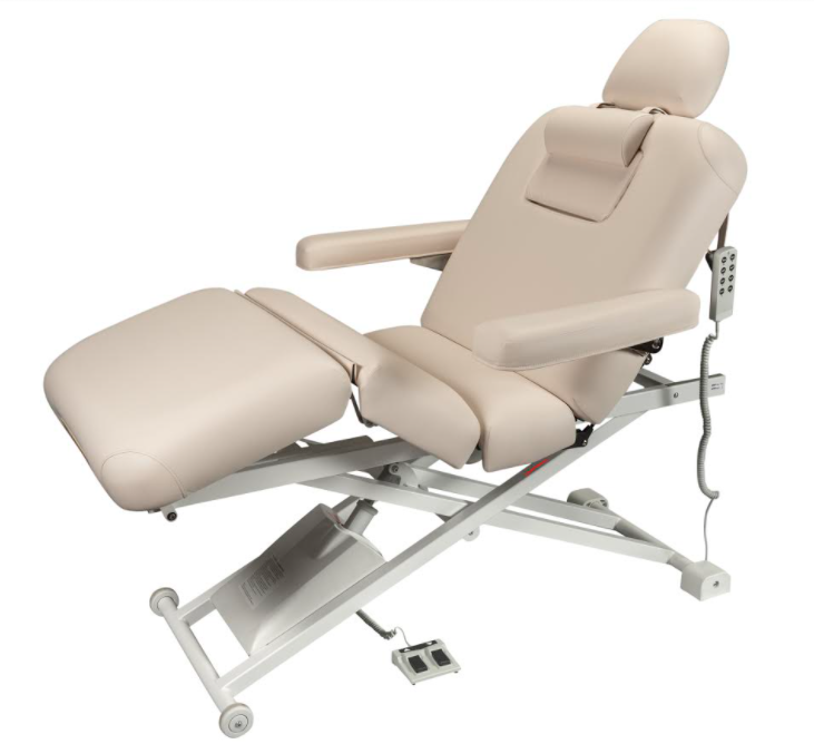 Nirvana Salon Top Electric Massage Table—beige, adjustable, with remote and foot pedal.