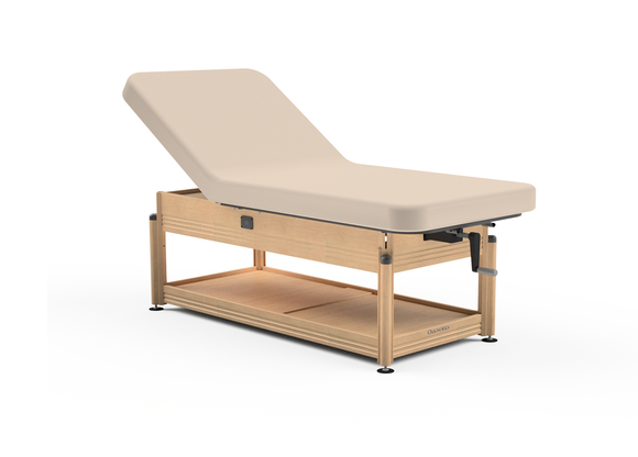 Oakworks CLINICIAN manual-hydraulic exam table with lift-assist backrest and open shelf.