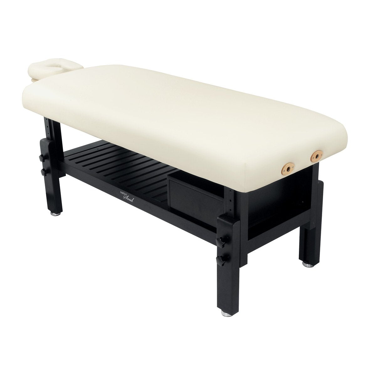 The Comfort Soul DENALI Spa Treatment Table features a white top and sleek black legs.
