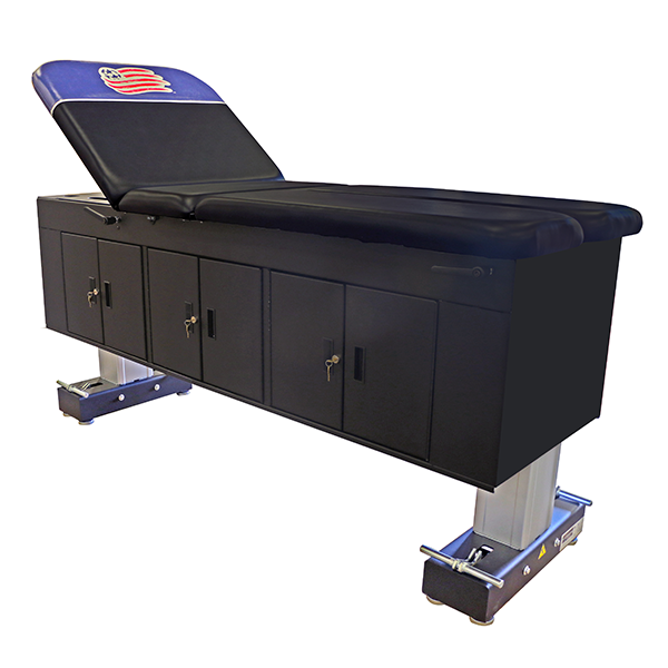 PHS Medical ET Treatment Cabinet—black, adjustable height, storage, flag logo on headrest.