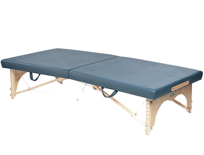 Custom Craftworks Classic Feldenkrais Technique Table with blue padding and wooden legs, open.