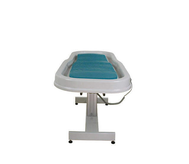 TouchAmerica Neptune Battery Wet Table with blue cushion, perfect for exams or hydrotherapy.