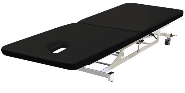 The PHS Medical Thera-P Bobath is a black electric treatment table with padding and face hole.