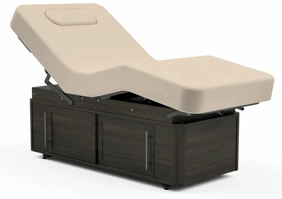 Oakworks CELESTA Electric Salon Top: adjustable beige spa table with storage, dark wood base.