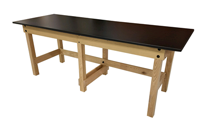 The PHS Chiropractic CLASSROOM/LAB Treatment Table features a black top and sturdy legs.