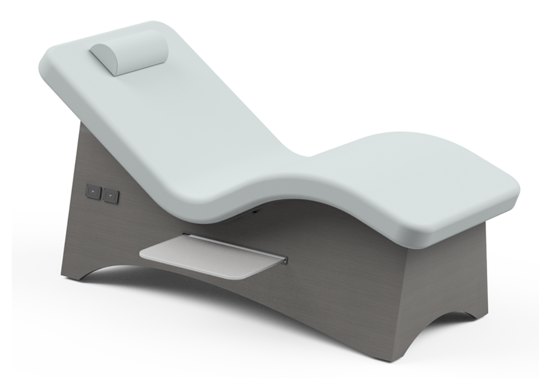 Oakworks CURVA Lounger with AeroCel padding, light cushion, and dark wooden base.