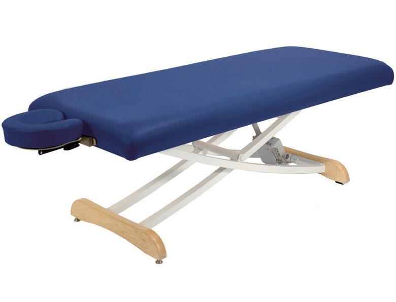 Custom Craftworks ELEGANCE BASIC table with blue padding, wood legs, headrest, and adjustments.